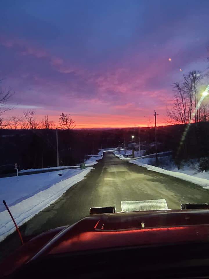McAdoo's plow truck on an early morning sunrise to get salting completed